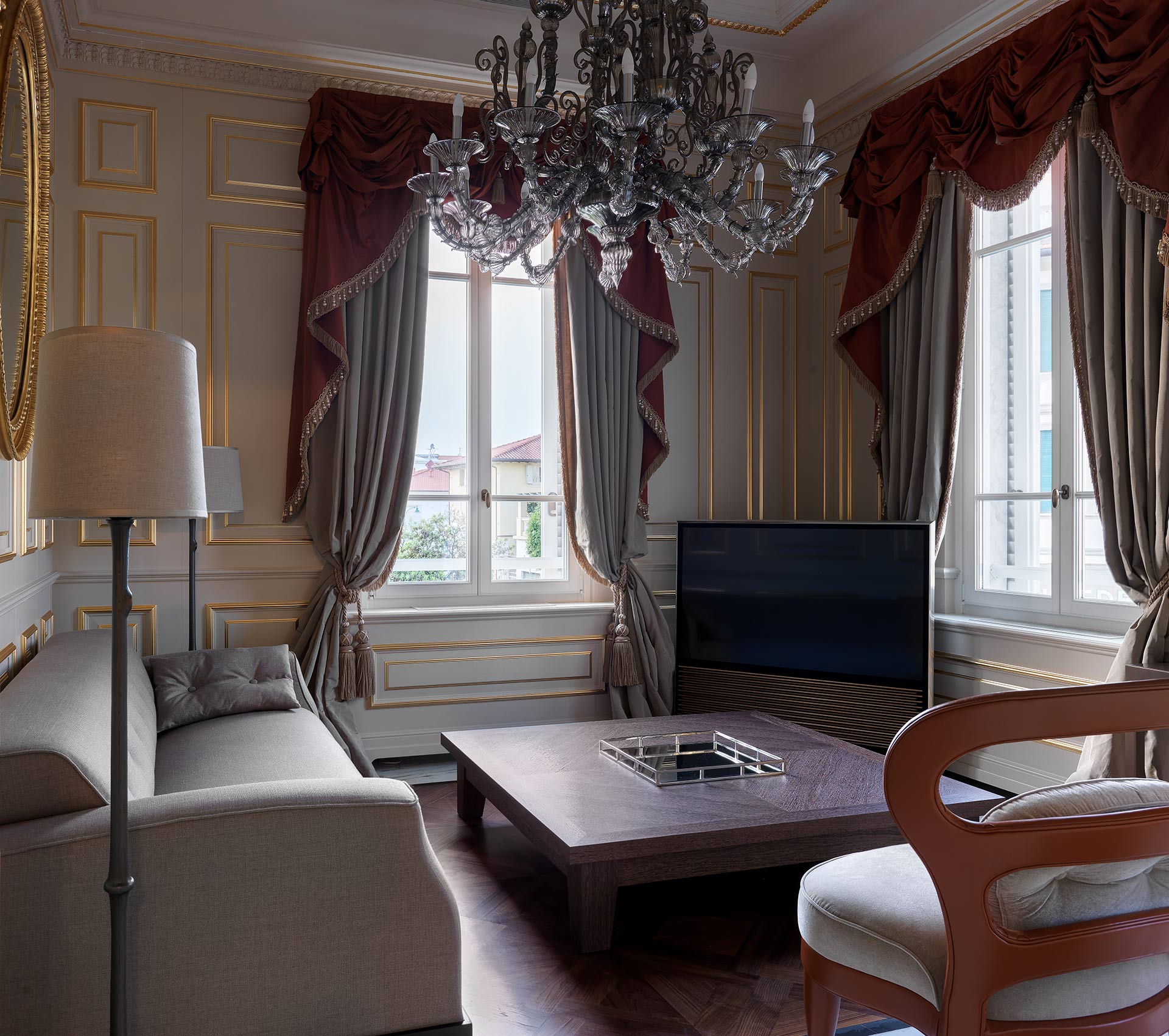 Living room of La Datcha, a luxury resort in Forte dei Marmi, Italy, furnished with Promemoria | Promemoria