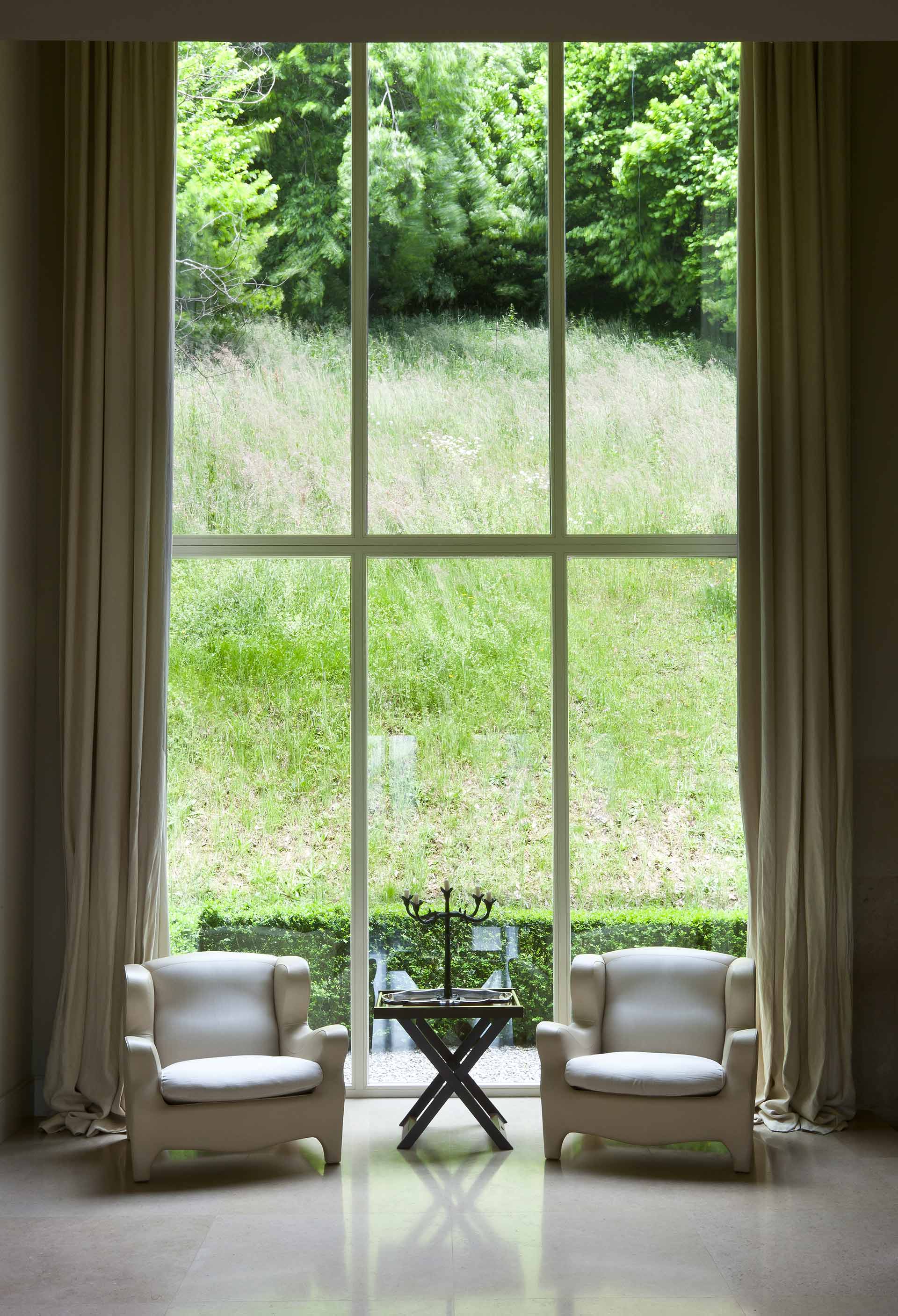 Living room in a private residence in Austria furnished with Promemoria | Promemoria