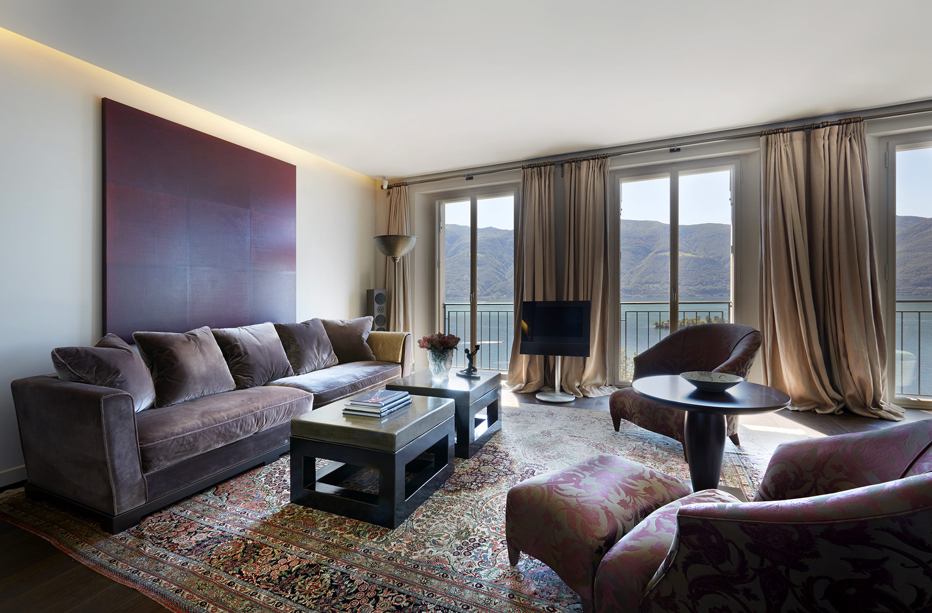 Living room in a private residence in Locarno, Switzerland furnished with Promemoria | Promemoria