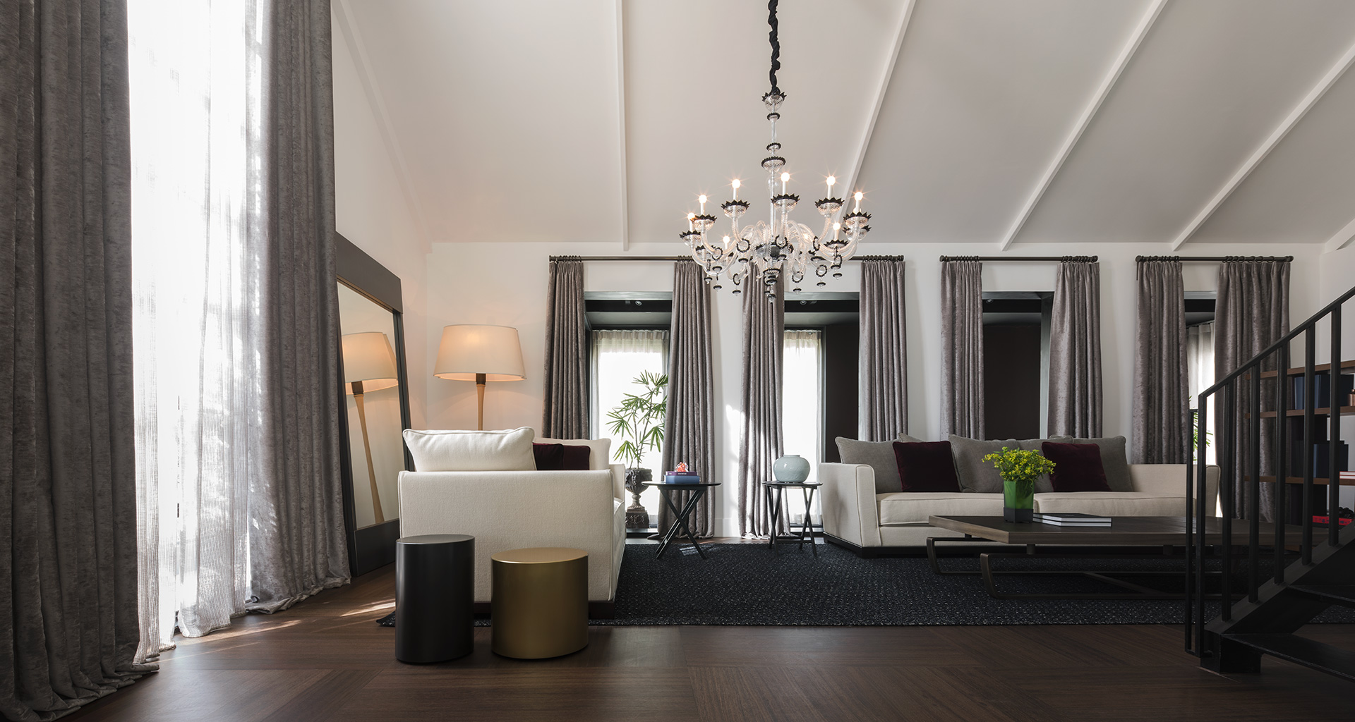 Living room in a showroom in Bangkok, Indonesia, furnished with Promemoria | Promemoria