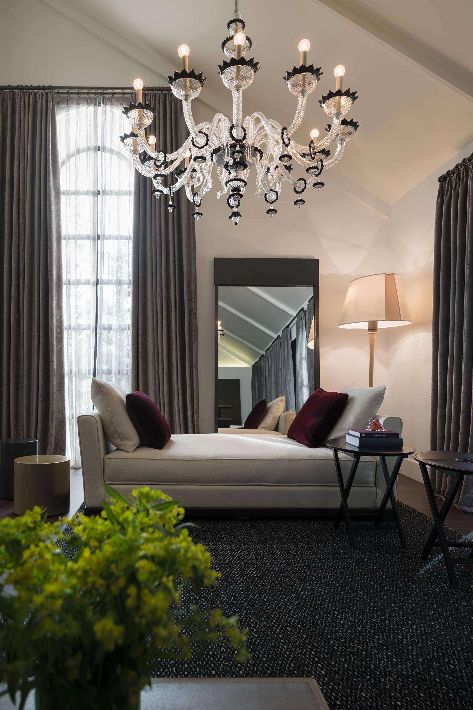 Living room in a showroom in Bangkok, Indonesia, furnished with Promemoria | Promemoria