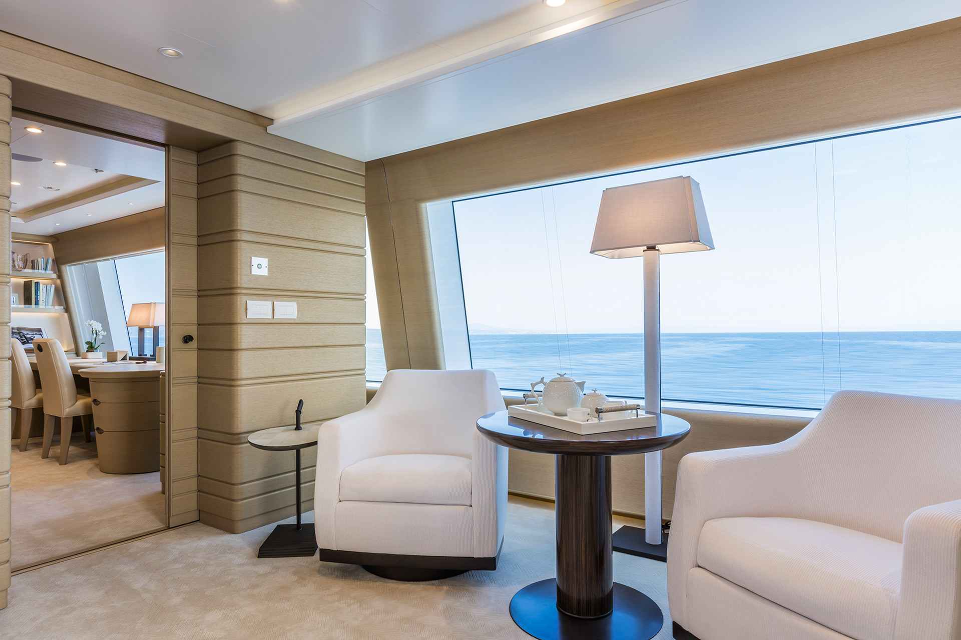 Living room of a Yacht designed by FM Architettura and furnished with Promemoria | Promemoria
